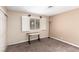 Bedroom featuring a desk, carpet, and window with shutters at 3905 Cherokee Ave, Las Vegas, NV 89121