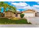 Charming single-story home with a well-maintained lawn, lovely desert landscaping, and an attached two-car garage at 3905 Cherokee Ave, Las Vegas, NV 89121