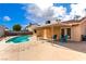 Backyard view featuring pool and covered patio at 3905 Cherokee Ave, Las Vegas, NV 89121