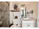 Stylish bathroom with modern fixtures, tiled shower, and sleek vanity at 421 Malpaso St, Las Vegas, NV 89138