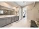 Bright bathroom with double vanity sinks and a glass-enclosed shower at 421 Malpaso St, Las Vegas, NV 89138