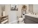 Stylish bathroom features a modern vanity, marble countertop, and decorative shelving at 421 Malpaso St, Las Vegas, NV 89138