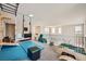 Spacious playroom with plenty of activities, including a climbing wall, gymnastic rings, and an area for building legos at 421 Malpaso St, Las Vegas, NV 89138