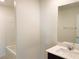 Bathroom featuring a tub-shower combination and sleek vanity at 4274 Tarim St, Las Vegas, NV 89147