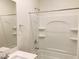 Clean bathroom featuring a shower-tub combo, mirror, and white countertops at 4274 Tarim St, Las Vegas, NV 89147
