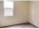 Bedroom with neutral paint, carpet, a window, and natural light at 4274 Tarim St, Las Vegas, NV 89147
