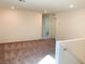 Upstairs living room area with neutral paint, carpet, and natural light at 4274 Tarim St, Las Vegas, NV 89147