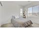Cozy bedroom with a comfortable bed and bright windows offering natural light at 4436 Mural Glen Ct, North Las Vegas, NV 89084