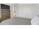 Bedroom featuring a dresser and closet, offering ample storage space at 4436 Mural Glen Ct, North Las Vegas, NV 89084