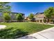 Community greenspace offers a grassy area for relaxation and recreation at 4436 Mural Glen Ct, North Las Vegas, NV 89084