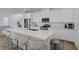 Kitchen featuring stainless steel appliances, island, and eat in bar at 4436 Mural Glen Ct, North Las Vegas, NV 89084