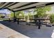 Covered picnic area with multiple tables, perfect for community gatherings and outdoor events at 4436 Mural Glen Ct, North Las Vegas, NV 89084