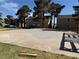 Expansive community grounds showcasing open space, mature trees, and nearby residential buildings at 4670 Tracylynn Ln, Las Vegas, NV 89121