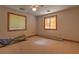 Bright bedroom with ample natural light, windows, and a ceiling fan at 481 Jarvis Rd, Pahrump, NV 89060