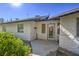 Exterior view features a well-lit front entrance and textured siding at 481 Jarvis Rd, Pahrump, NV 89060