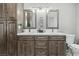 This bathroom boasts double sinks, a shower, and ample storage space at 4813 Canadian Dr, Las Vegas, NV 89130