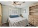 Cozy bedroom with shuttered windows offers natural light and a peaceful ambiance for a restful sleep at 4813 Canadian Dr, Las Vegas, NV 89130