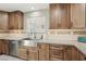 Well-lit kitchen with stainless steel appliances and tile backsplash provides both beauty and function at 4813 Canadian Dr, Las Vegas, NV 89130