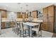 Beautiful kitchen with a large island, modern appliances, stylish lighting, and plenty of counter space at 4813 Canadian Dr, Las Vegas, NV 89130