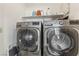 Convenient laundry area with front-load washer and dryer, making laundry tasks a breeze at 4813 Canadian Dr, Las Vegas, NV 89130