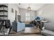 Inviting living room with vaulted ceilings, wood floors, and plenty of natural light for a cozy atmosphere at 4813 Canadian Dr, Las Vegas, NV 89130