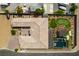 A bird's eye view of the home and backyard with a manicured lawn and pool at 5120 Lone View Pl, Las Vegas, NV 89149
