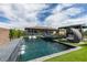 Backyard with pool, waterfall feature, desert landscape, and patio with gazebo at 5120 Lone View Pl, Las Vegas, NV 89149