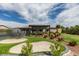 Backyard featuring a putting green, sand trap, and patio with a gazebo at 5120 Lone View Pl, Las Vegas, NV 89149
