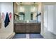 Elegant bathroom featuring a dual vanity, granite countertops, and modern fixtures at 5120 Lone View Pl, Las Vegas, NV 89149