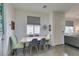 Bright dining area with contemporary table set and modern decor elements at 5120 Lone View Pl, Las Vegas, NV 89149