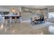 Contemporary dining area with a sleek bar counter and easy access to the kitchen at 5120 Lone View Pl, Las Vegas, NV 89149