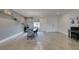 Modern dining area with gray accent wall and piano at 5120 Lone View Pl, Las Vegas, NV 89149