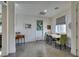 Bright dining area features modern decor, light wood table, and a window providing natural light at 5120 Lone View Pl, Las Vegas, NV 89149