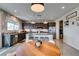 Stylish kitchen featuring granite countertops, stainless steel appliances, an island with barstools, and a bright, open layout at 5120 Lone View Pl, Las Vegas, NV 89149