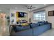 Inviting living room with sectional sofa, media center, and bright natural light at 5120 Lone View Pl, Las Vegas, NV 89149