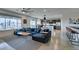 Comfortable living room featuring a sectional sofa, ceiling fan and open layout at 5120 Lone View Pl, Las Vegas, NV 89149