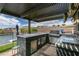 Outdoor kitchen with BBQ, sink and stainless steel storage, next to the pool at 5120 Lone View Pl, Las Vegas, NV 89149