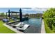 Inviting backyard pool with lounge seating and shaded pergola at 5120 Lone View Pl, Las Vegas, NV 89149