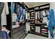 Organized walk-in closet featuring custom shelving and ample storage space at 5120 Lone View Pl, Las Vegas, NV 89149