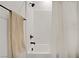 Bathroom featuring tiled shower, modern fixtures, and clean design at 525 Monarch Ridge Ct, North Las Vegas, NV 89084
