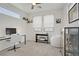 Bright office space with desk and chair, natural light, and additional decor at 525 Monarch Ridge Ct, North Las Vegas, NV 89084
