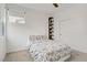 Cozy bedroom with closet, decor shelving, and natural light at 525 Monarch Ridge Ct, North Las Vegas, NV 89084