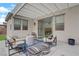 Cozy patio features a pergola, stylish furniture, and ample room for outdoor entertaining at 525 Monarch Ridge Ct, North Las Vegas, NV 89084