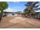 View of the backyard showing detached structures, offering extra space and versatility at 5867 Bunch St, Las Vegas, NV 89122