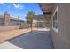 Backyard features a covered patio area and adjacent shed at 5867 Bunch St, Las Vegas, NV 89122