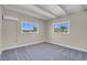 Spacious bedroom with neutral paint and large windows, allowing for plenty of natural light at 5867 Bunch St, Las Vegas, NV 89122