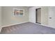 This bedroom has neutral paint and a large closet with an opening to a rod to hang items at 5867 Bunch St, Las Vegas, NV 89122