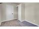 Bedroom features neutral walls, carpet flooring, closet, and a conveniently located electrical outlet at 5867 Bunch St, Las Vegas, NV 89122