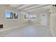 Bright living room with multiple windows and marble flooring at 5867 Bunch St, Las Vegas, NV 89122