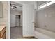 Bathroom with vanity and combination tub and shower with view to bedroom and closet at 5903 Karnes Ranch Ave, Las Vegas, NV 89131